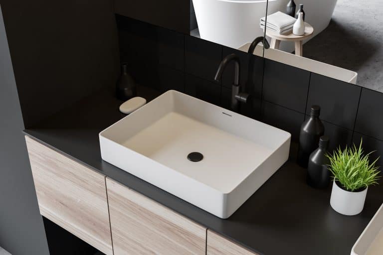 Top view of sink in gray bathroom, How Much Does It Cost To Replace The Bathroom Sink?