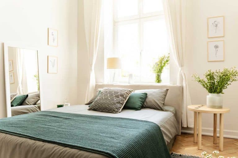 An eco cotton linen and blanket on a bed in nature loving family guest house for spring and summer vacation, How Many Bed Pillows Is Too Many?