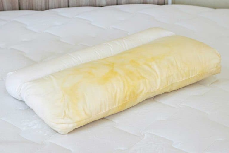 Pillow with yellow saliva stains, Why Do Pillows Turn Yellow (And How To Fix The Problem)