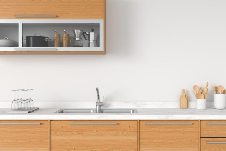 A modern white kitchen countertop with sink, How To Fill A Gap Between Countertops And Wall