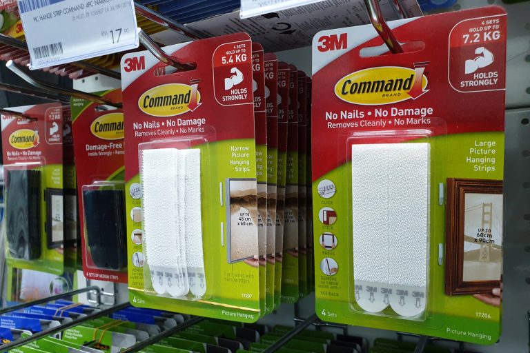 Command brand Picture Hanging Strips and Hooks by 3M company on store shelf, Can You Hang Shelves With Command Strips Or Hooks?