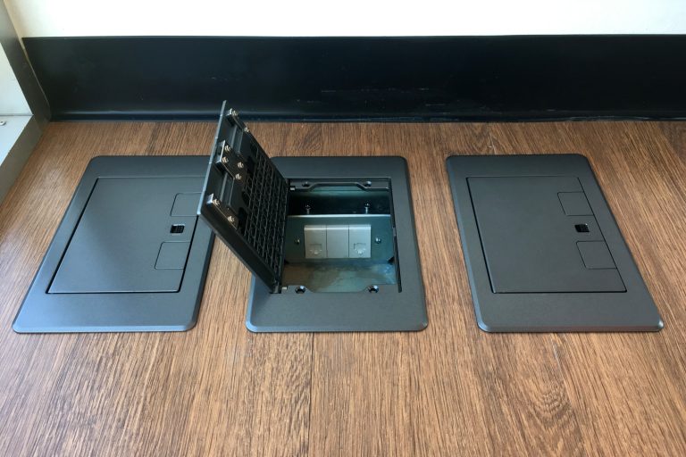 Floor plug,pop up plug in metal cover installed in wooden floor.Electrical work.System engineering - How To Hide Power Recliner Cords