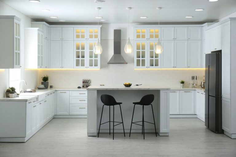 Beautiful kitchen interior with new stylish furniture, How Much Space Between Island And Refrigerator?