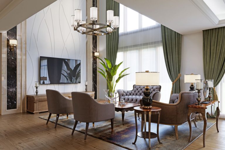 Interior of a luxurious modern house with wooden flooring, luxurious chandelier with rustic sofas and couches, 11 Wall Decor Ideas For High Ceilings