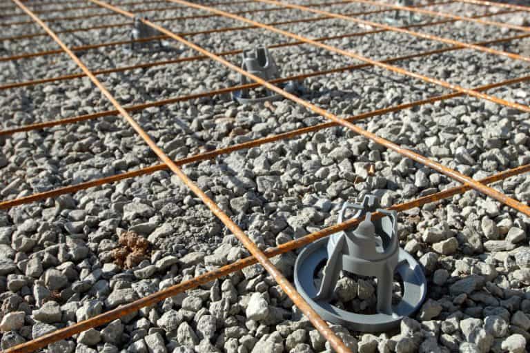 Foundation of a road before pouring concrete, Can You Pour Concrete Over Gravel?
