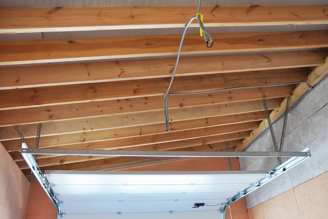 Garage Door Post Rail and Spring Installation Assembly Garage Ceiling.