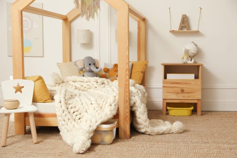 Stylish child room interior with house bed - What Color Nightstand Goes With A Beige Bed [8 Color Suggestions To Inspire You]