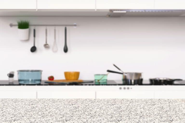 Empty granite counter in kitchen, What Causes Pitting In Granite Countertops?
