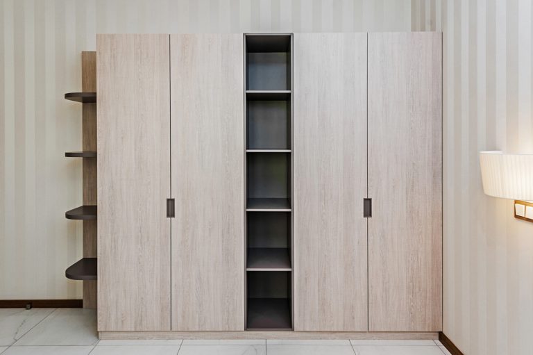 Modern wooden wardrobe in the room, How To Paint Mirrored Closet Doors [Step By Step Guide]