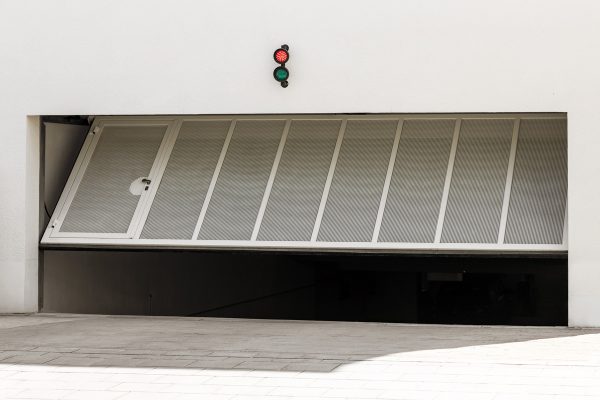 Garage Gate or Door Opening to Underground Car Parking. Modern Automatic Garage Gate with Entrance Door and Lamp, Can I Use Old Sensors With A New Garage Door Opener?