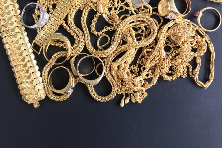 Gold Jewelry in a dark mat or sheet