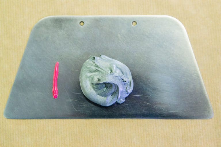 A polyester putty photographed up close, How Long Does Bondo Take To Dry? Uncovering Timelines With & Without Hardener
