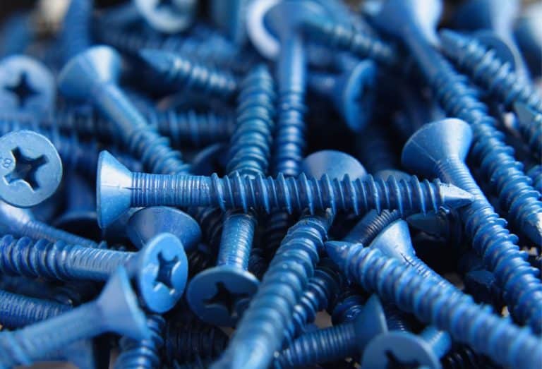 Pile of blue flat head concrete screws