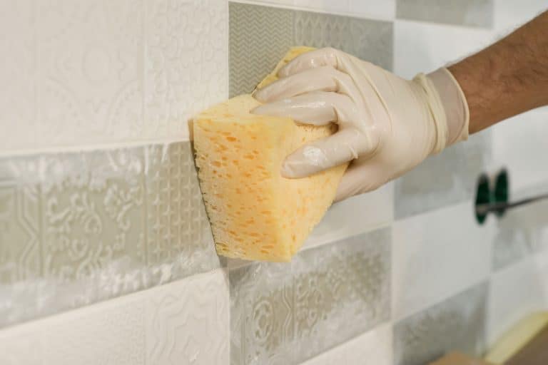Tile rubbing compound on the grout